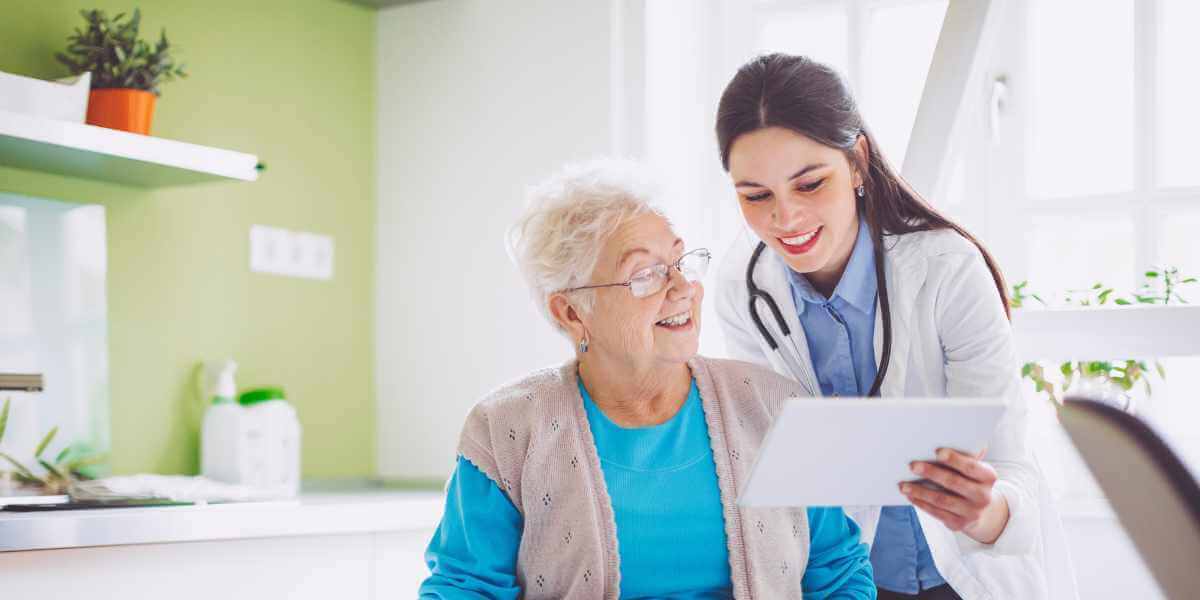 elderly woman with doctor